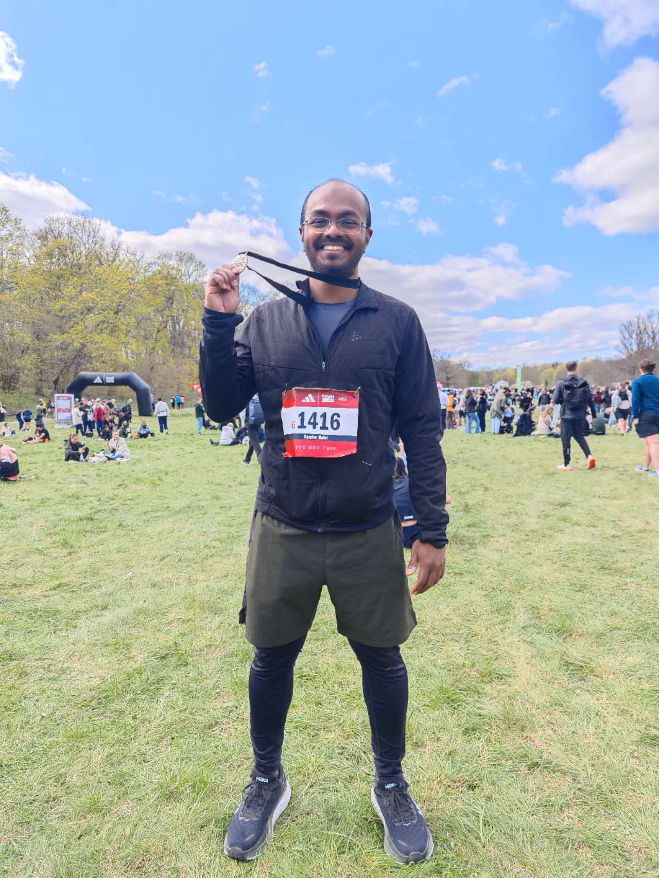 Finishing my first half marathon — Stockholm, spring 2025.